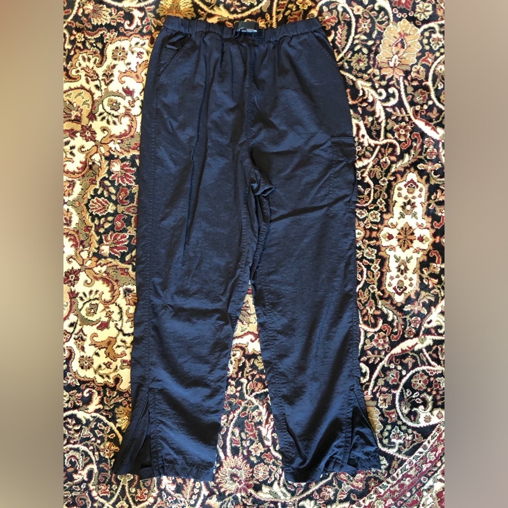 Men's Prospirit Black elastic waist 100% nylon pants . Zip pockets and hem